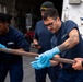 Members onboard the Coast Guard Cutter Munro participate in damage control training