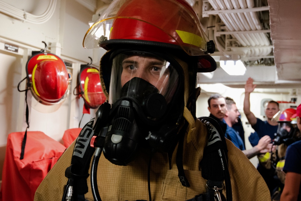 Members aboard Coast Guard Cutter Munro participate in damage control training