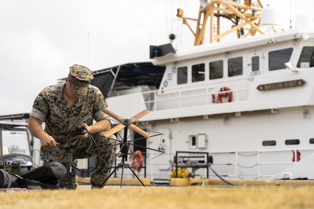 LSE21-3d Reg Comms Marines establish Communications with Coastguardsmen