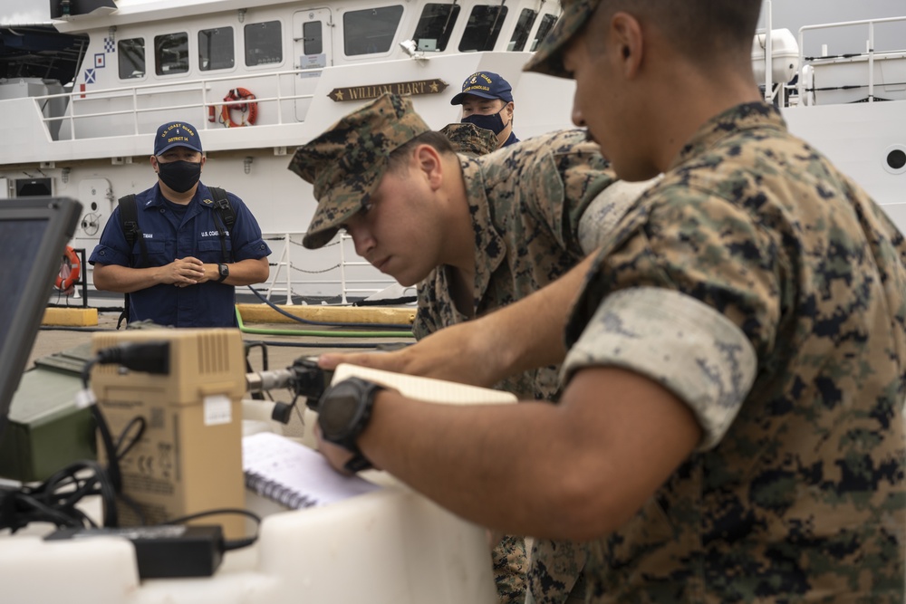 LSE21-3d Reg Comms Marines establish Communications with Coastguardsmen