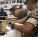 LSE21-3d Reg Comms Marines establish Communications with Coastguardsmen