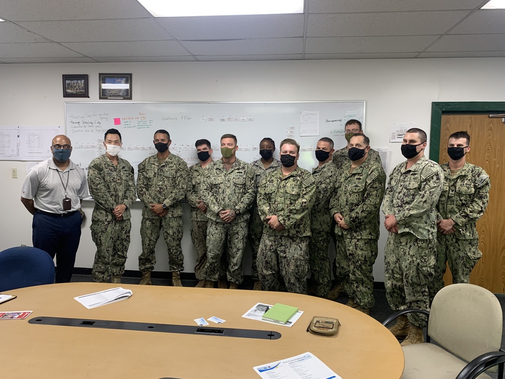 U.S. Navy Seabees with NMCB-5's Detail Sasebo take over from NMCB-4