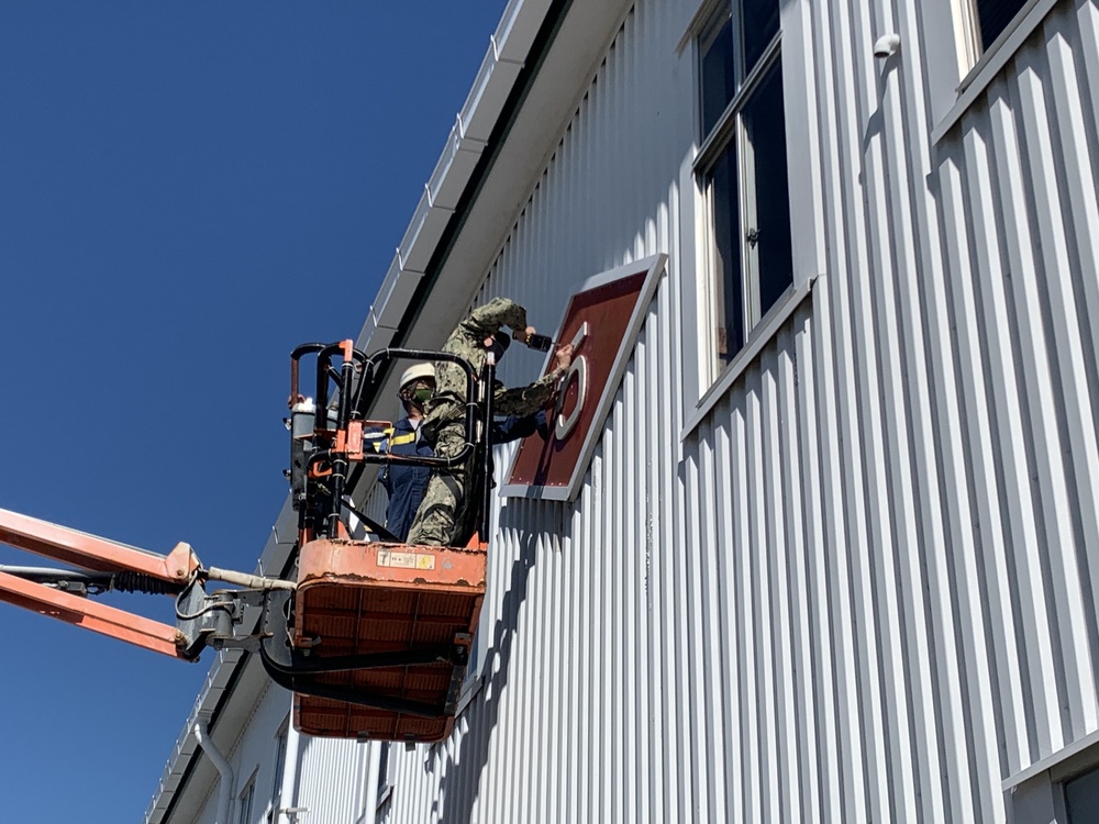 U.S. Navy Seabees with NMCB-5's Detail Sasebo take over from NMCB-4