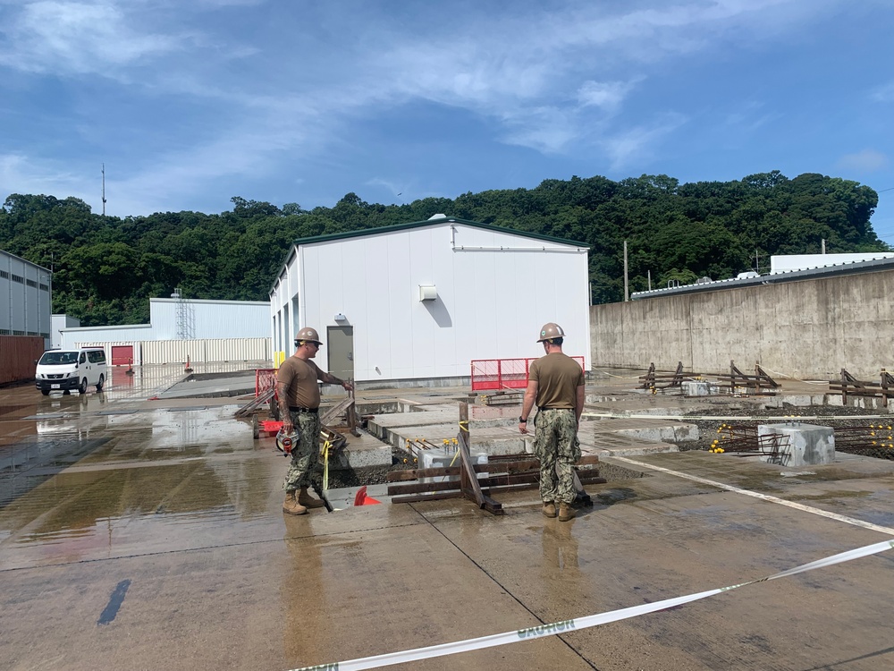 U.S. Navy Seabees with NMCB-5's Detail Sasebo take over from NMCB-4