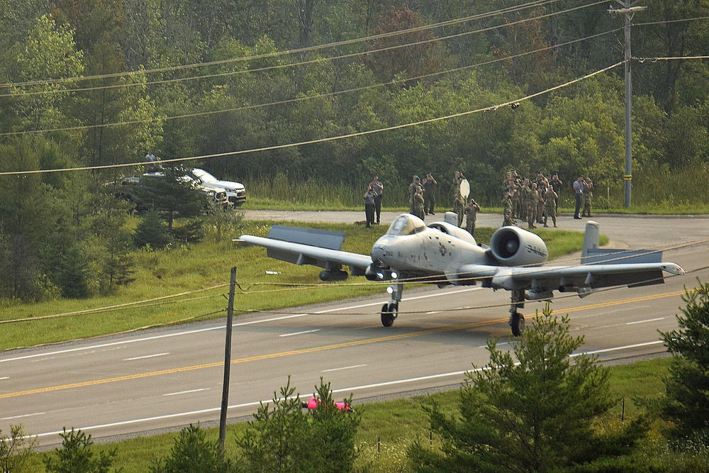 <em>An A-10 lands and takes off from a public highway near Alpena, Michigan (U.S. Air Force)</em>