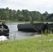 926th EN BDE Soldiers guide collapsible raft into the water