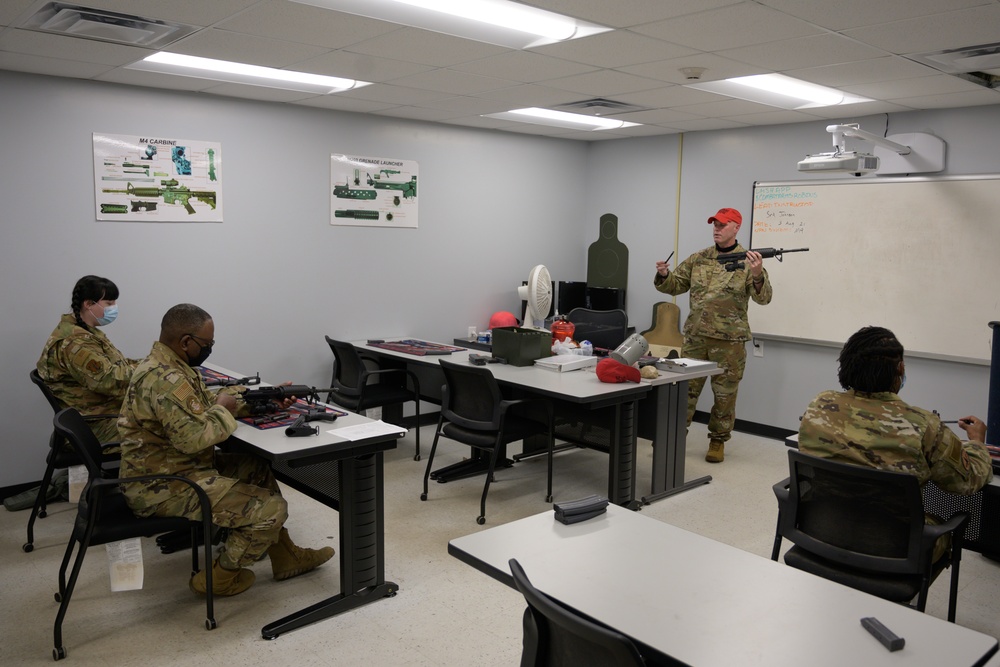 Airmen with the 116th Air Control Wing attend the  rifle qualification course