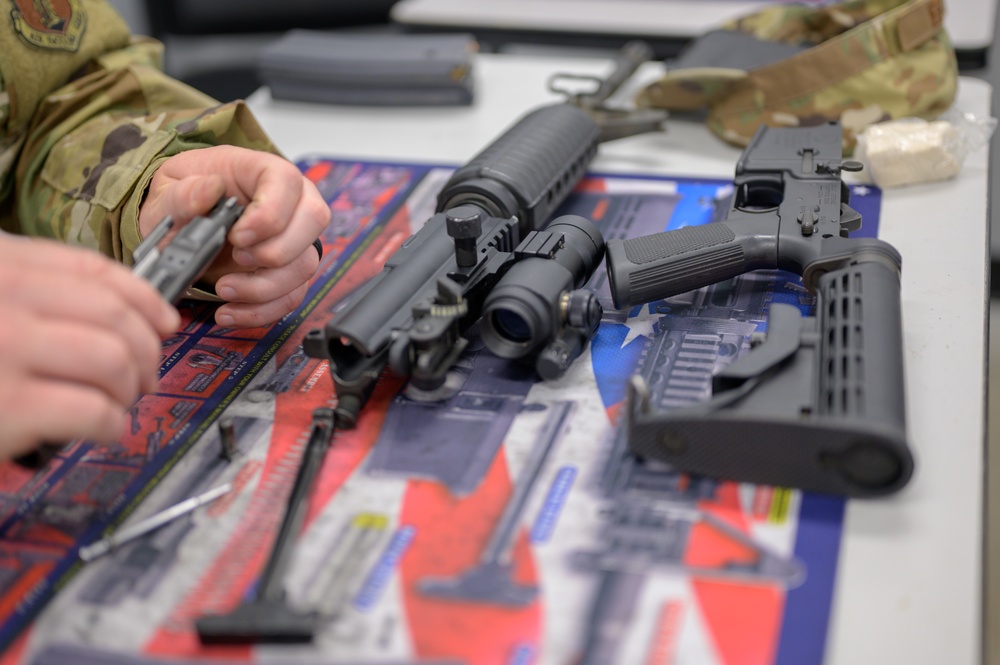 Airmen with the 116th Air Control Wing attend the  rifle qualification course