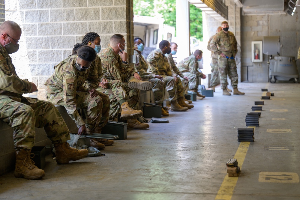 Airmen with the 116th Air Control Wing attend the  rifle qualification course