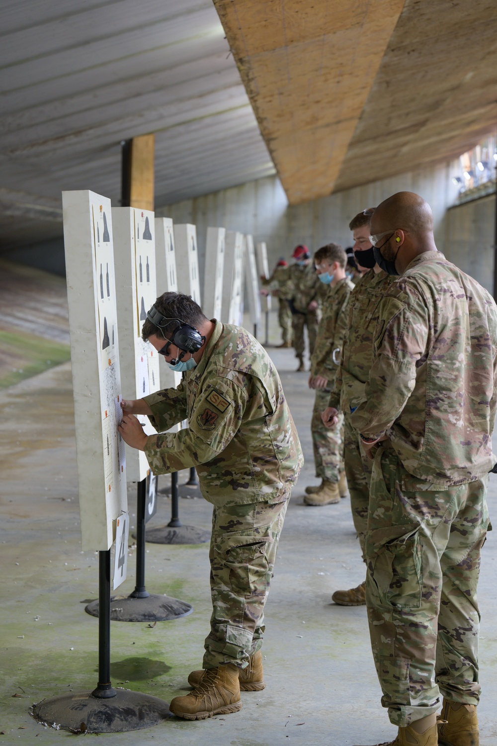 Airmen with the 116th Air Control Wing attend the  rifle qualification course