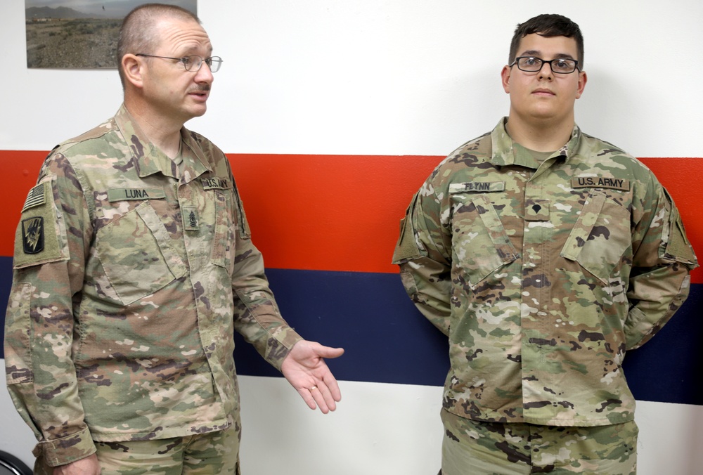 Brig. Gen. Michael Adame and Brig. Gen. Joseph Reale coin Soldiers at Camp Buehring