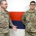 Brig. Gen. Michael Adame and Brig. Gen. Joseph Reale coin Soldiers at Camp Buehring