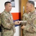 Brig. Gen. Michael Adame and Brig. Gen. Joseph Reale coin Soldiers at Camp Buehring