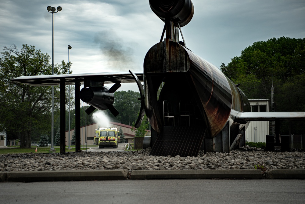 Latvian and Alpena CRTC firefighters simulate aircraft fire