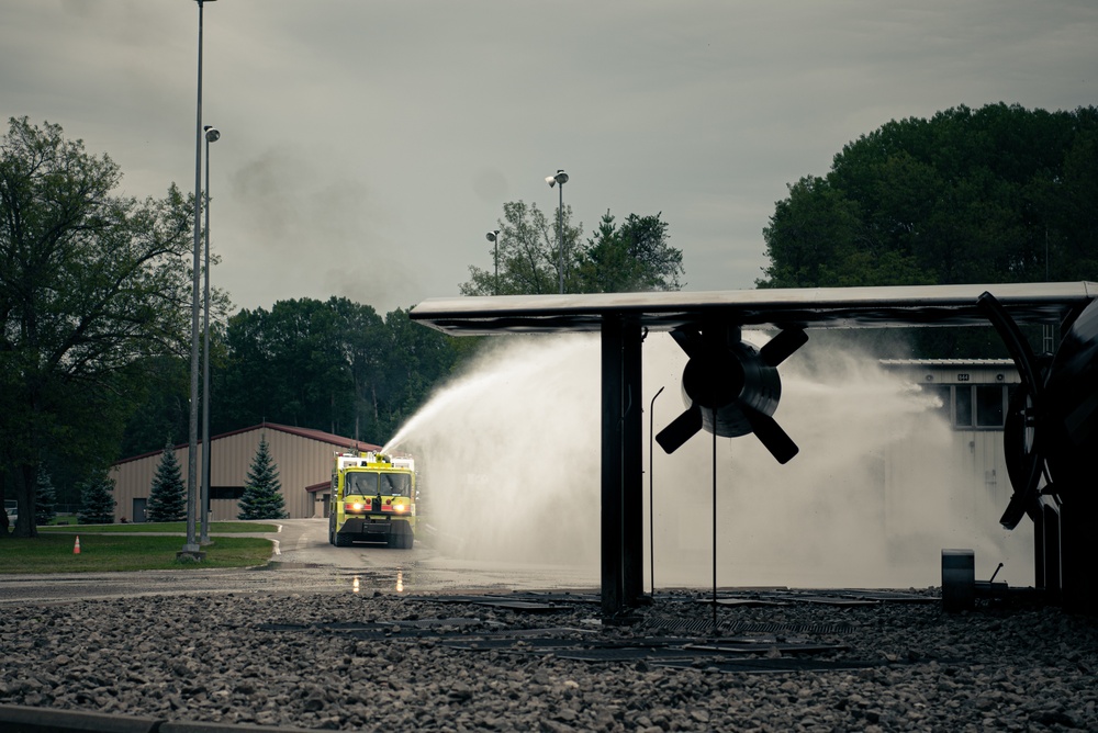 Latvian and Alpena CRTC firefighters simulate aircraft fire