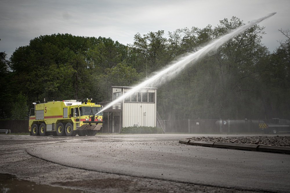 Latvian and Alpena CRTC firefighters simulate aircraft fire