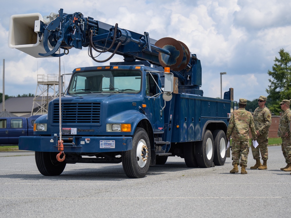 Airmen train on the bucket truck