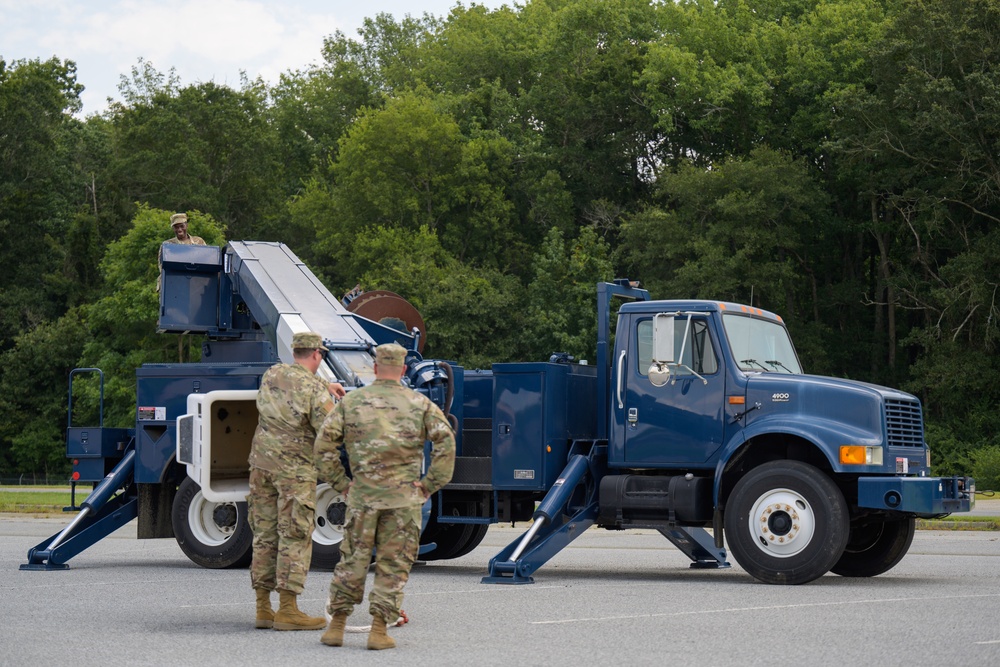 Airmen train on the bucket truck