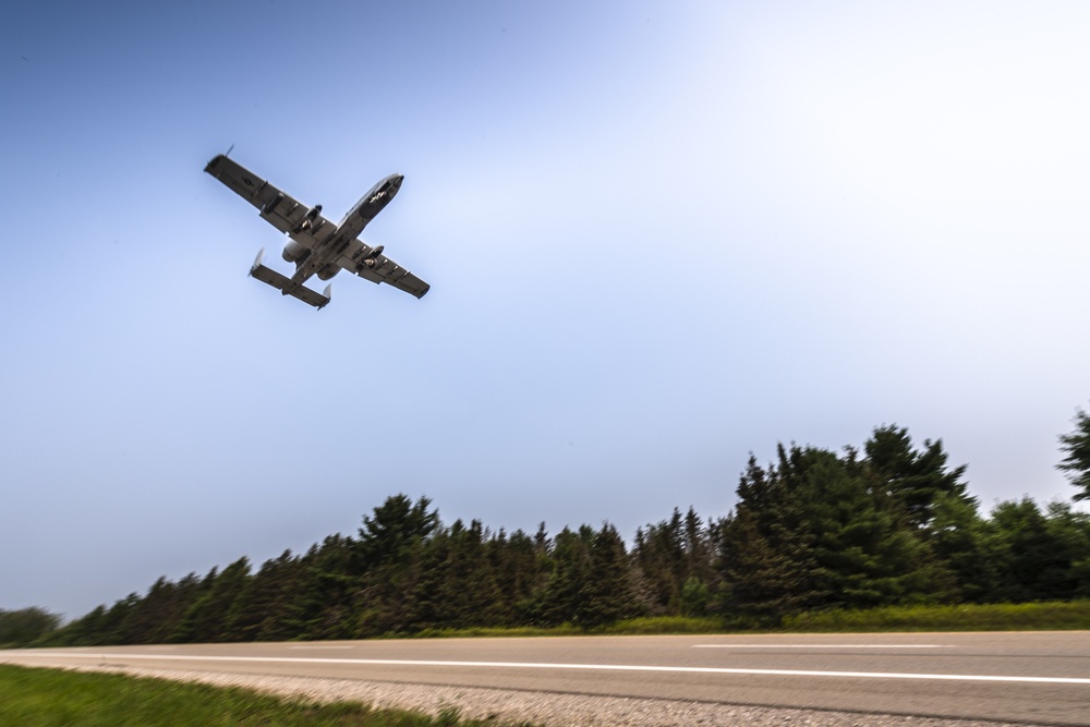 Aircraft landing along highway during Northern Strike 21