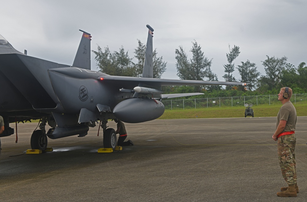 Service members work together ensuring mission success during Pacific Iron 21