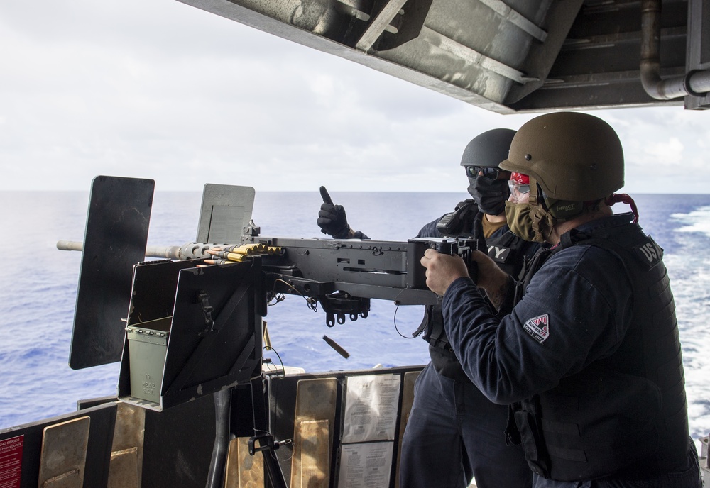Sailors participate in gun shoot