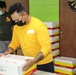 Guam Sailors and Deployed Marines Package Food for Families in Need