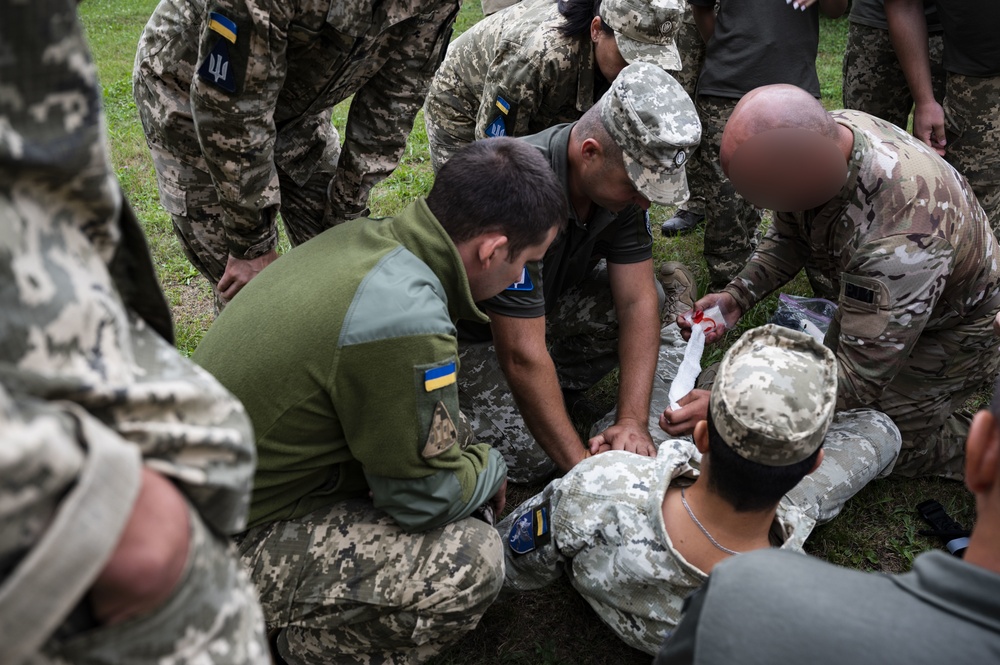 352d Special Operations Forces and Ukrainian Air Force Members Conduct Tactical Combat Casualty Care Training