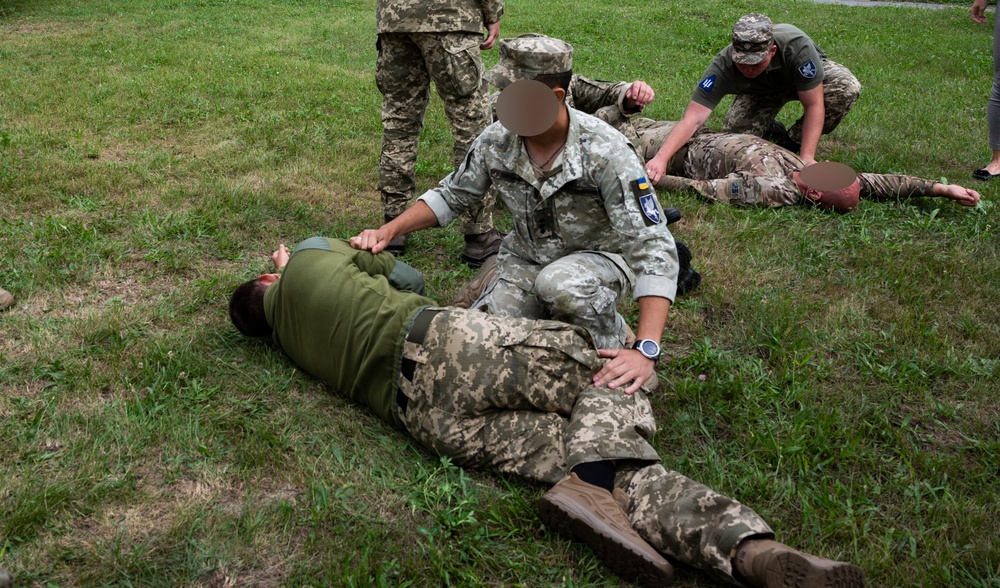 352d Special Operations Forces and Ukrainian Air Force Members Conduct Tactical Combat Casualty Care Training