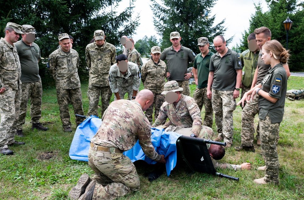 352d Special Operations Forces and Ukrainian Air Force Members Conduct Tactical Combat Casualty Care Training