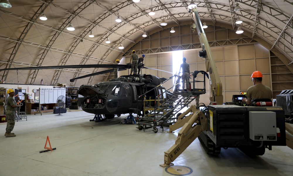 Task Force Phoenix, Bravo Company, 640th Aviation Support Battalion mechanics conducts UH-60 Black Hawk helicopter maintenance