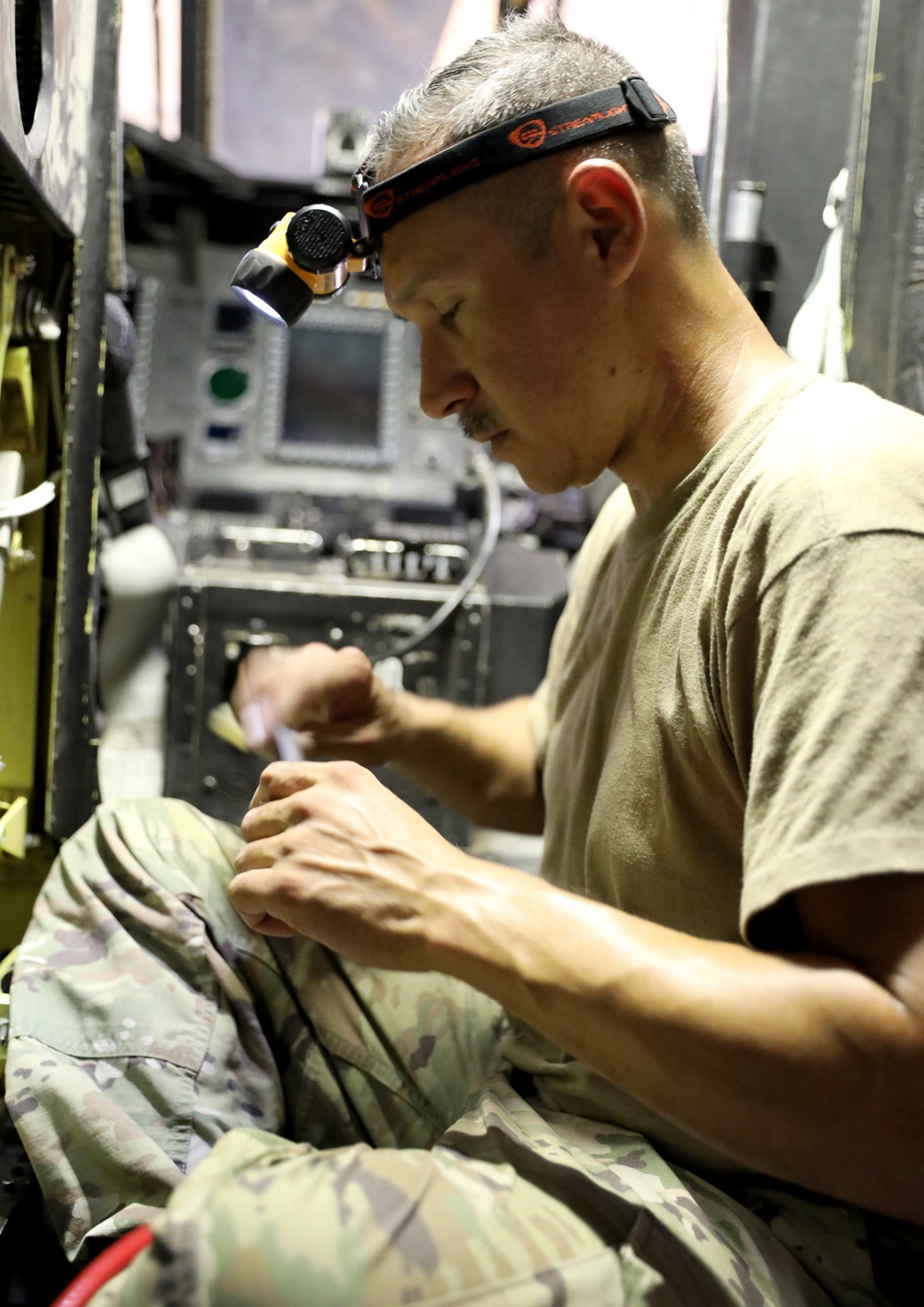 Task Force Phoenix, Bravo Company, 640th Aviation Support Battalion mechanics conducts CH-47 Chinook helicopter maintenance