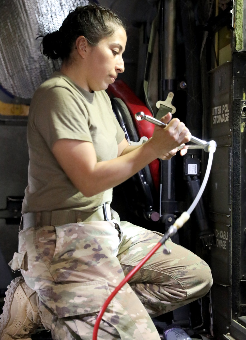 Task Force Phoenix, Bravo Company, 640th Aviation Support Battalion mechanics conducts CH-47 Chinook helicopter maintenance