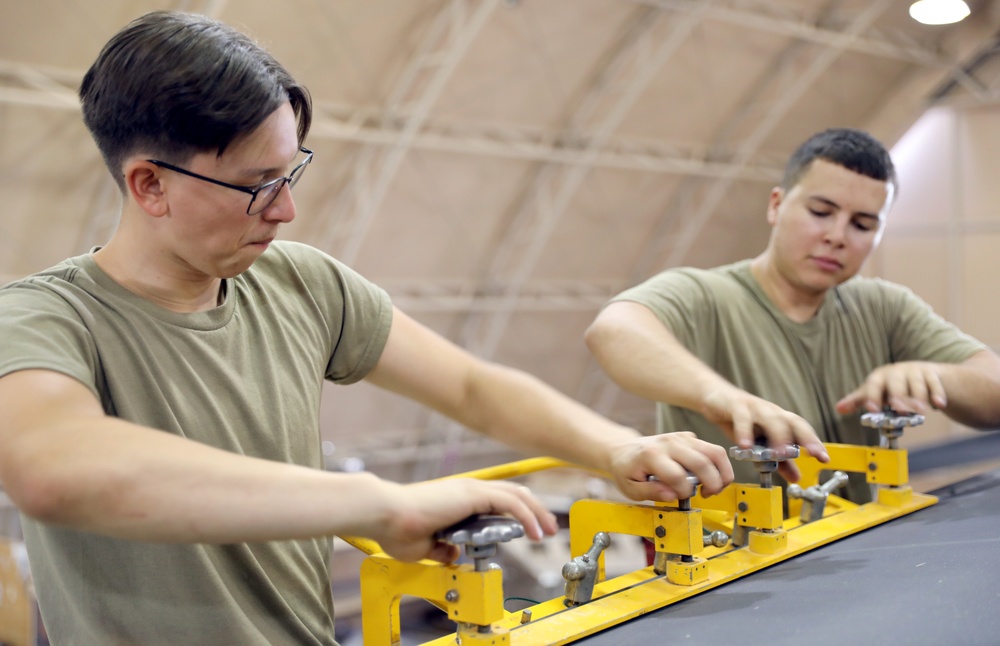 Task Force Phoenix, Bravo Company, 640th Aviation Support Battalion mechanics conducts CH-47 Chinook helicopter maintenance