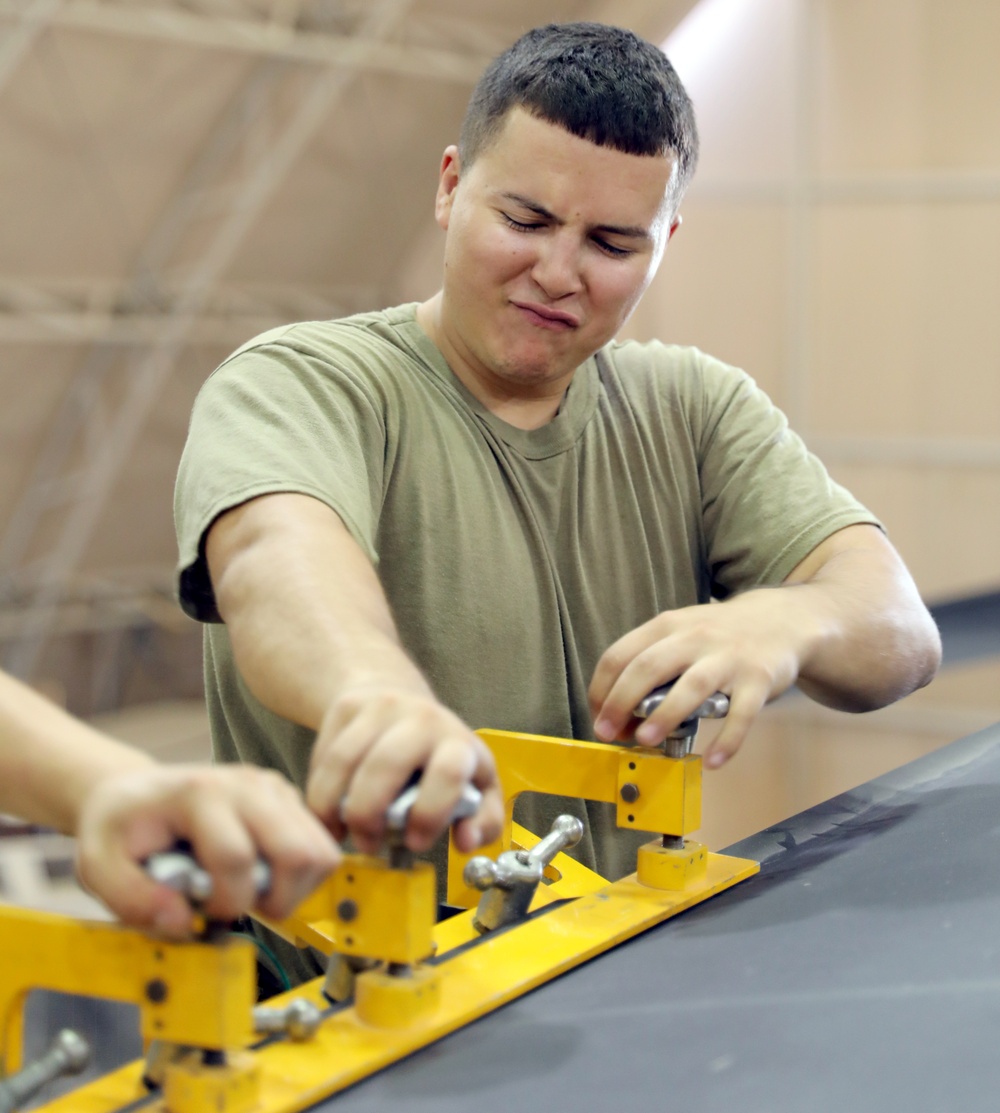 Task Force Phoenix, Bravo Company, 640th Aviation Support Battalion mechanics conducts CH-47 Chinook helicopter maintenance