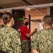 210803-N-YF306-0114 NEWPORT, R.I. (August 4, 2021)  Recruit Division Commander Instructs Officer Candidates During Small Arms Qualification
