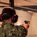 210803-N-YF306-0342 NEWPORT, R.I. (Aug. 4, 2021) Officer Candidate Fires M9 Pistol During Small Arms Qualification