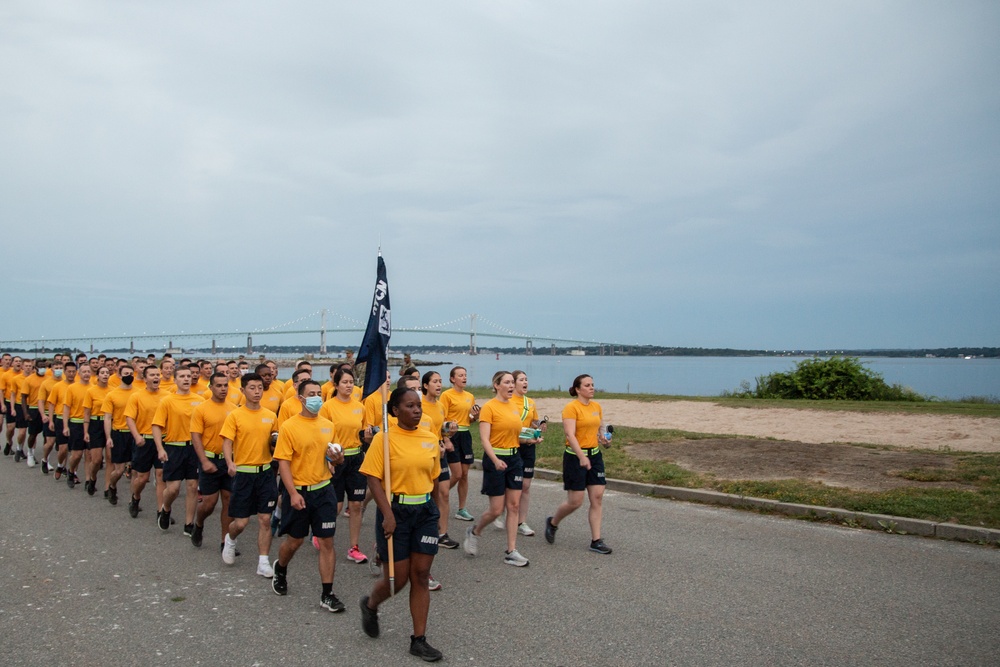 210804-N-YF306-0143 NEWPORT, R.I. (August 4, 2021) Officer Candidates March After Earning Guidon