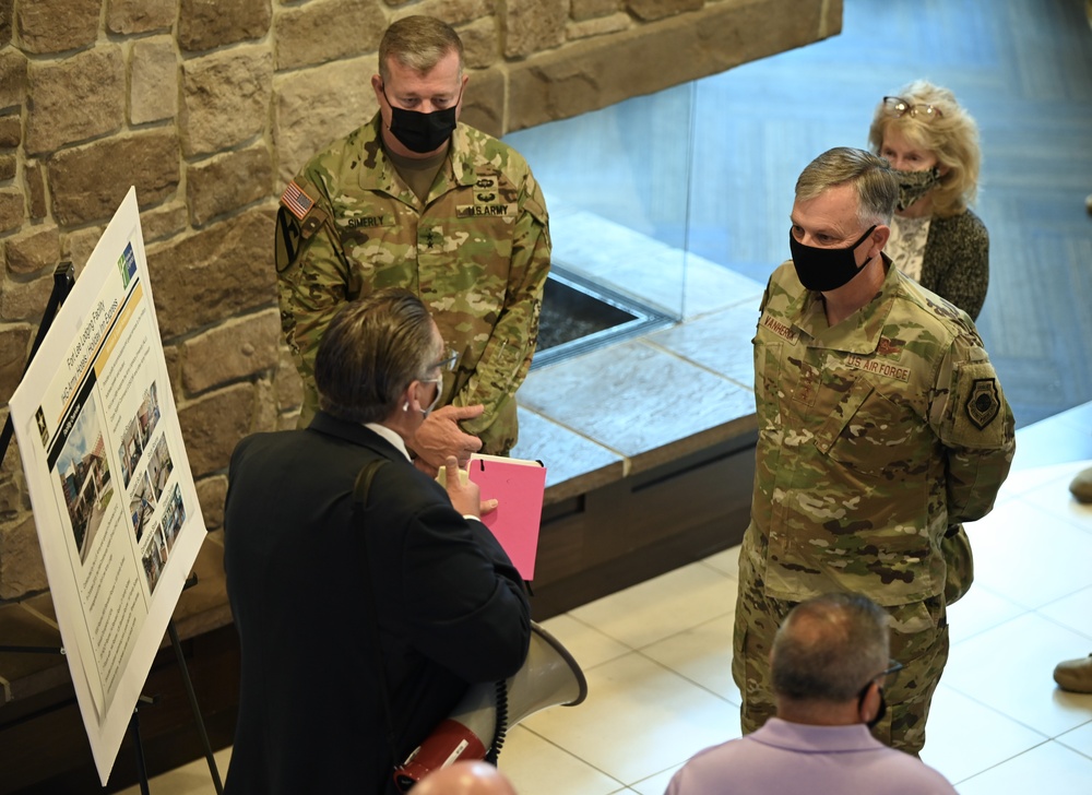 U.S. Air Force Gen. Glen VanHerck, commander of North American Aerospace Defense Command and U.S. Northern Command, receives a tour from Task Force Eagle leadership.