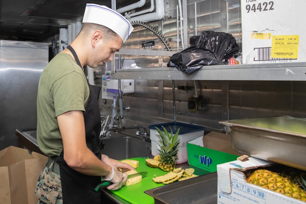 Sailors And Marines Prepare Dinner