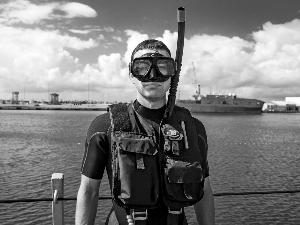 USS Billings Sailor Poses for a Picture While Conducting SAR Training