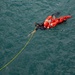 USS Billings Search and Rescue (SAR) Sailor Recovers Dummy During SAR Training