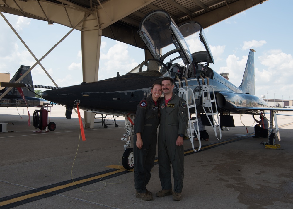 Wingtip-to-wingtip: Join spouse pilot couple sticks together through career, life and flight