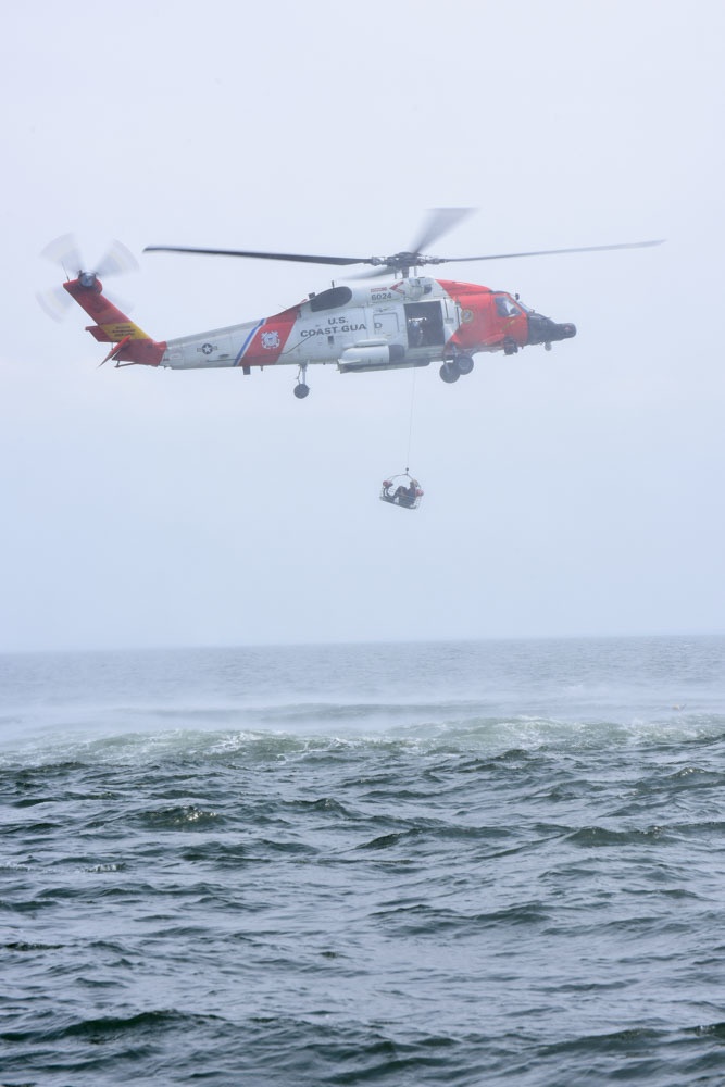 Coast Guard conducts helicopter hoist training off Virginia coast