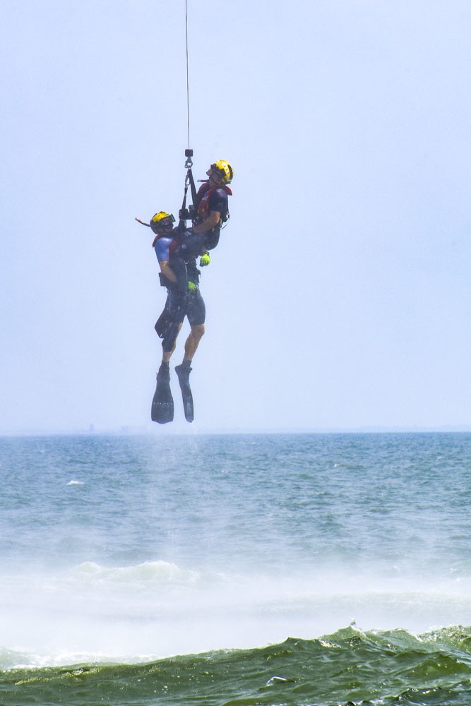 Coast Guard conducts helicopter hoist training off Virginia coast