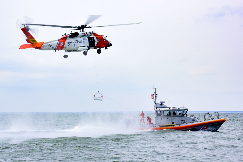 Coast Guard conducts helicopter hoist training off Virginia coast