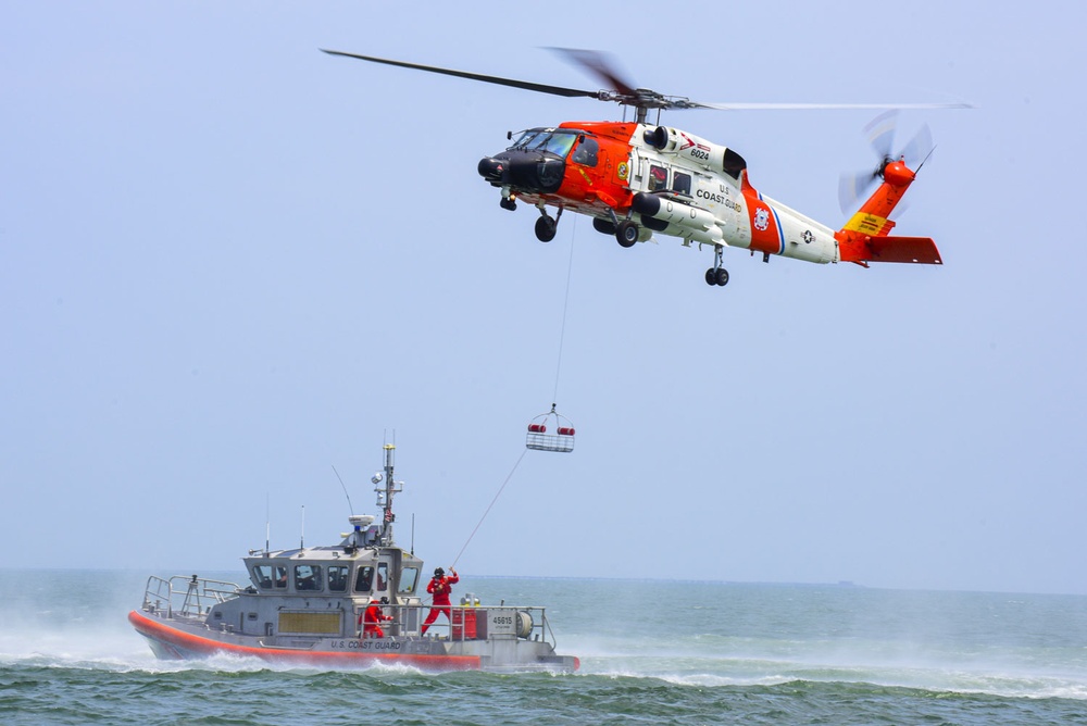 Coast Guard conducts helicopter hoist training off Virginia coast