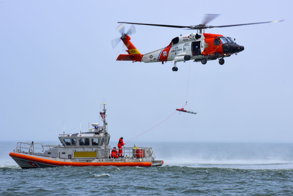 Coast Guard conducts helicopter hoist training off Virginia coast