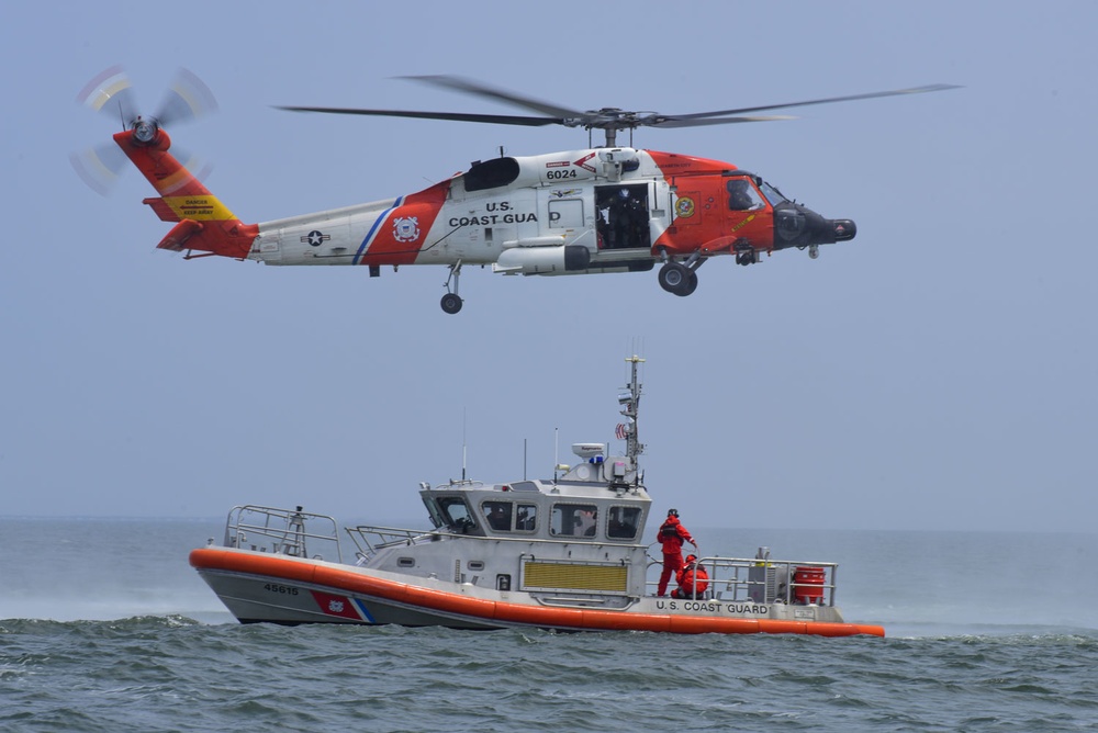 Coast Guard conducts helicopter hoist training off Virginia coast