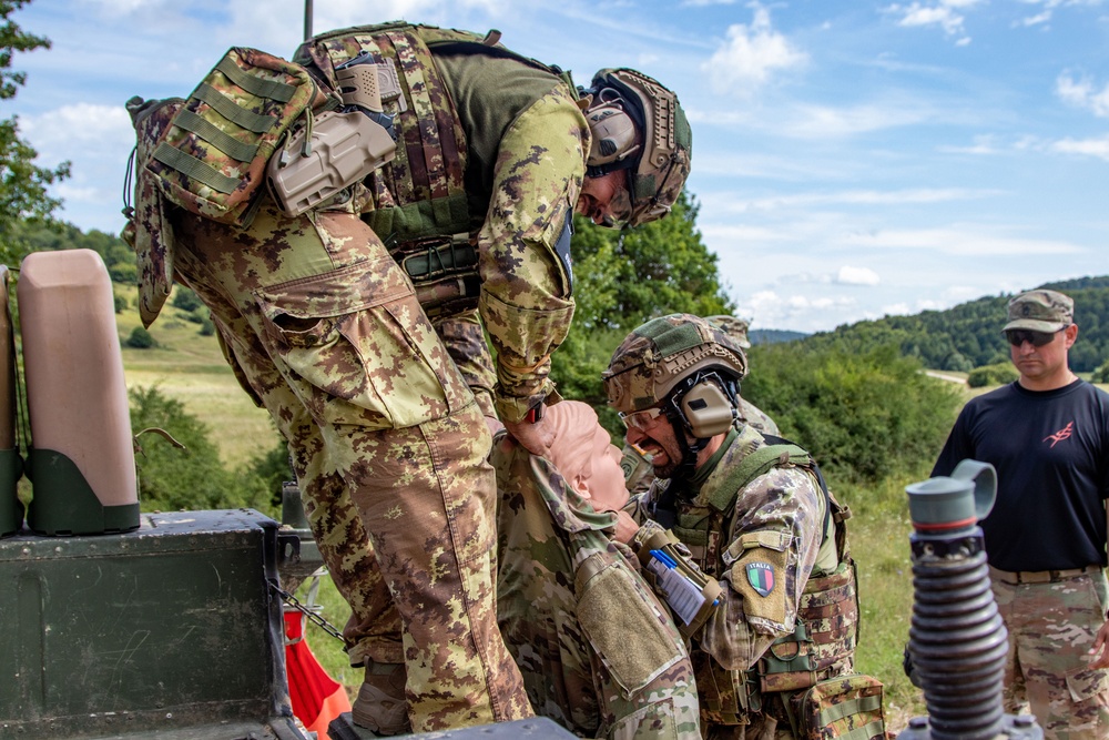 DVIDS - Images - Italians lifting training dummy [Image 1 of 8]