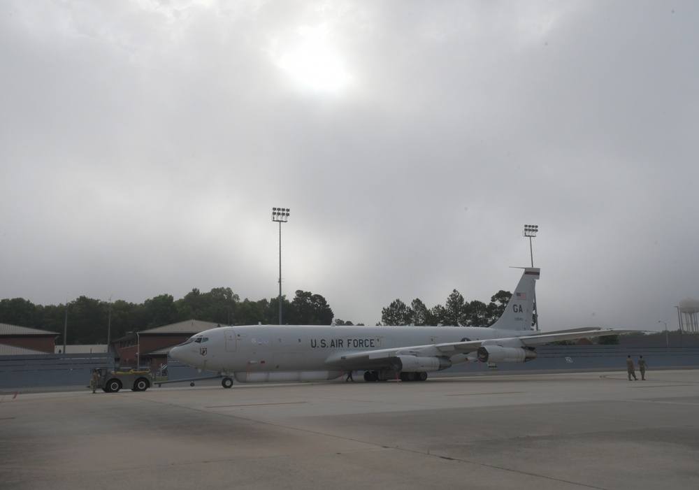 Photo of E-8C Joint STARS Aircraft Entering Hangar